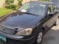 Black Nissan Sentra for sale in Esteban Abada -3