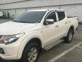 Selling Pearl White Mitsubishi Strada in Cainta-2