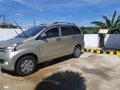 Selling Gold Toyota Avanza 2013 Van in Cavite City-6