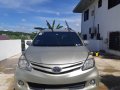 Selling Gold Toyota Avanza 2013 Van in Cavite City-4