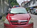 Red Toyota Innova for sale in Manila-3