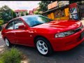 Red Mitsubishi Lancer for sale in Quezon City-3