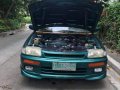 Green Mazda Protege for sale in Buenavista-1