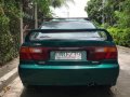 Green Mazda Protege for sale in Buenavista-5