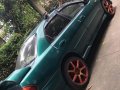 Green Mazda Protege for sale in Buenavista-6