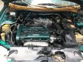 Green Mazda Protege for sale in Buenavista-2