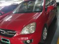Red Kia Carens for sale in Quezon-1