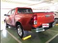 Orange Toyota Hilux 2018 at 27364 km for sale in Manila-1