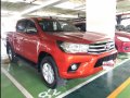 Orange Toyota Hilux 2018 at 27364 km for sale in Manila-0