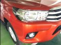 Orange Toyota Hilux 2018 at 27364 km for sale in Manila-7