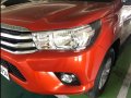 Orange Toyota Hilux 2018 at 27364 km for sale in Manila-1