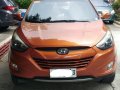 Sell Orange Hyundai Tucson in Manila-8