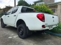 Sell Pearl White 2014 Mitsubishi Strada in Manila-1