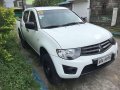 Sell Pearl White 2014 Mitsubishi Strada in Manila-1