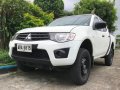 Sell Pearl White 2014 Mitsubishi Strada in Manila-0