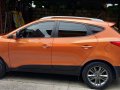 Sell Orange Hyundai Tucson in Manila-0
