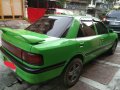 Green Mazda Familia for sale in Manila-0