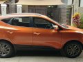 Sell Orange Hyundai Tucson in Manila-1