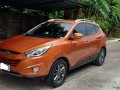 Sell Orange Hyundai Tucson in Manila-7