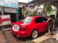 Red Mazda 323 1996 for sale in Quezon City-0