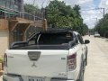 White Mitsubishi Strada 2016 for sale in Malabon City-1