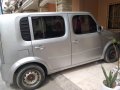 Sell Pearl White 2011 Nissan Cube in Consolacion-8
