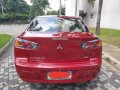 Red Mitsubishi Lancer 2013 for sale in Quezon City-2