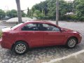 Red Mitsubishi Lancer 2013 for sale in Quezon City-4