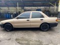 Golden Mitsubishi Lancer 1996 for sale in Caloocan-3