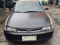 Golden Mitsubishi Lancer 1996 for sale in Caloocan-1