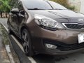 Brown Kia Rio 2014 for sale in Las Pinas -1