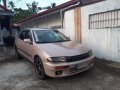 Selling Brown Mazda 323 1997 in San Pedro-5