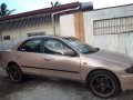 Selling Brown Mazda 323 1997 in San Pedro-2