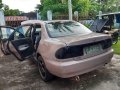 Selling Brown Mazda 323 1997 in San Pedro-3