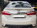 Selling Pearl White Toyota Corolla Altis 2016 in Angat-3