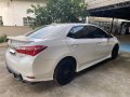 Selling Pearl White Toyota Corolla Altis 2016 in Angat-1