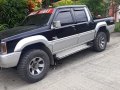 Selling Black Mitsubishi Strada 1995 in Davao-0