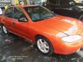 Orange Hyundai Elantra 2000 for sale in Taguig-0