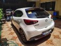 Pearl White Mazda 2 2015 for sale in Quezon City-2