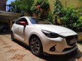 Pearl White Mazda 2 2015 for sale in Quezon City-3