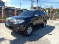 Black Toyota Fortuner 2010 for sale in Apalit-6