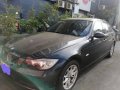 BLACK BMW 320I 2008-0