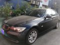 BLACK BMW 320I 2008-2