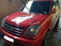 Sell Red 2013 Mitsubishi Adventure in Quezon City-1