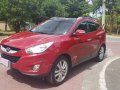 Selling Red Hyundai Tucson 2012 in Pasig-7