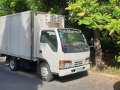 Pearl White Isuzu Elf 1999 for sale in Makati-0