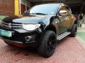 Sell Black 2012 Mitsubishi Strada in Manila-0