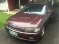 Selling Purple Mazda Familia 1998 in Quezon-1