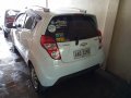 Pearl White Chevrolet Spark 2014 for sale in Manila-5