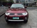Red Mitsubishi Montero Sport 2013 for sale in Makati City-0